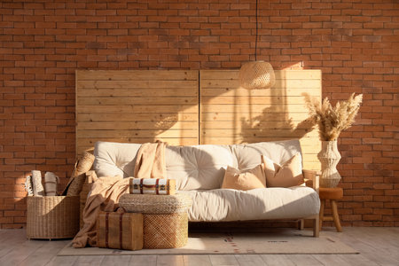 Interior of living room with couch, vintage suitcases and folding screenの写真素材