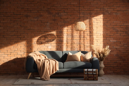 Interior of living room with black sofa and vintage suitcasesの写真素材