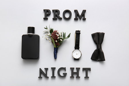 Words PROM NIGHT, male accessories and boutonniere on white backgroundの写真素材