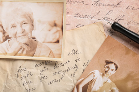 Old photos of relatives with letters, closeup. Concept of family treeの写真素材