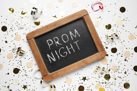 Chalkboard with text PROM NIGHT and confetti on white backgroundの写真素材