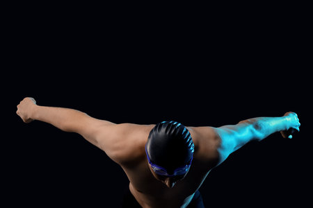 Male swimmer on black backgroundの写真素材