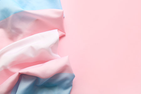 Transgender flag on pink background with space for textの写真素材