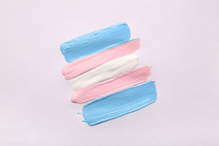 Transgender flag made of paint strokes on white backgroundの写真素材