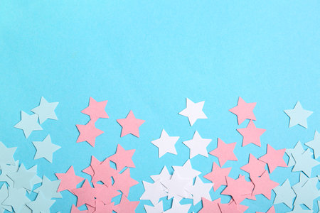 Many stars made of pink and blue colors on blue backgroundの写真素材