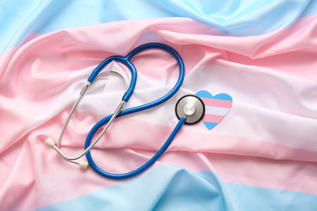 Paper heart with stethoscope on transgender flagの写真素材