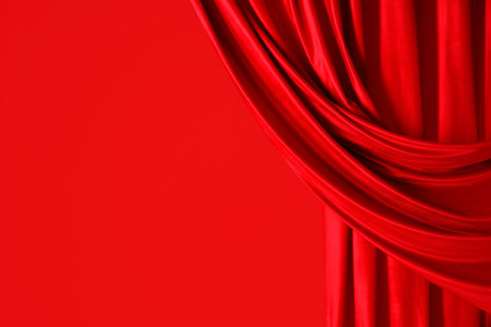 Red curtain on color backgroundの写真素材