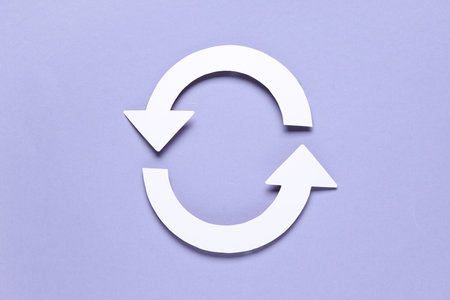 Circle arrows on lilac backgroundの写真素材