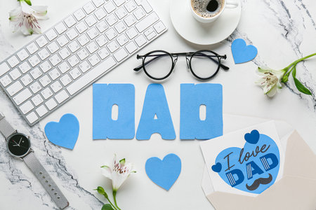 Word DAD with postcard, keyboard and cup of coffee for Father's Day on white grunge backgroundの写真素材