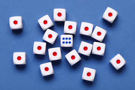 White game dices on blue background