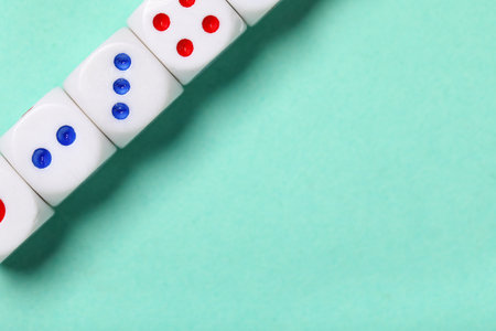 White game dices on turquoise backgroundの写真素材