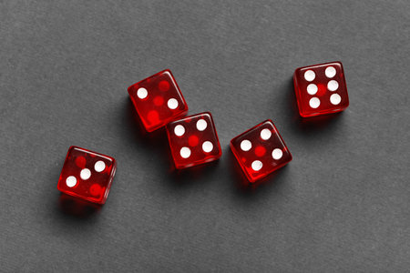 Red game dice on gray backgroundの写真素材