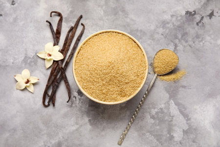 Bowl of sweet vanilla sugar on grunge background, top viewの写真素材