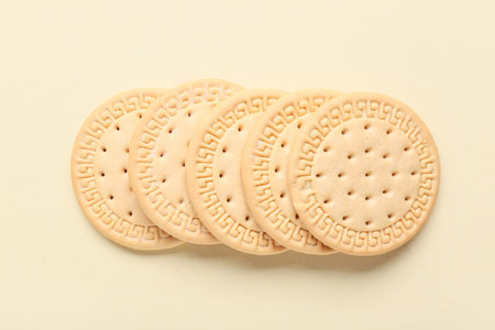 Four sweet cookies on yellow background