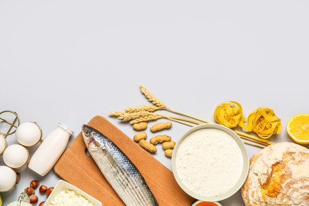 Different products on gray background. Food Allergy Awareness Monthの写真素材