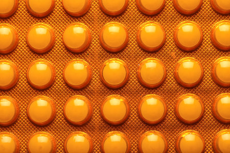 Texture of blister pack with pills as backgroundの写真素材
