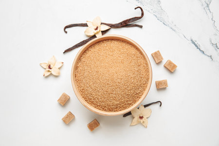 Bowl of sweet vanilla sugar on white background, top viewの写真素材