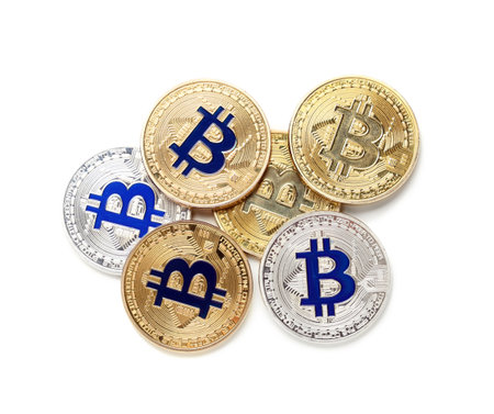 Different bitcoins on white background, top viewの写真素材
