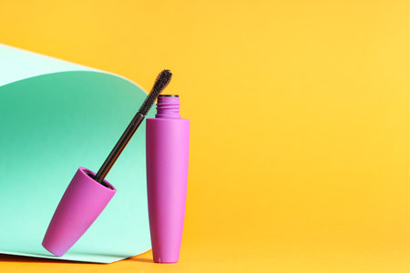 Black mascara on colorful backgroundの写真素材