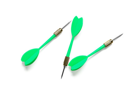 Green darts on white background