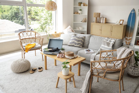 Interior of living room with sofa and armchairs