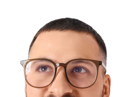 Handsome young man in eyeglasses on white background, closeupの写真素材