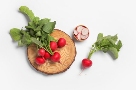 Composition with ripe radish on white backgroundの写真素材