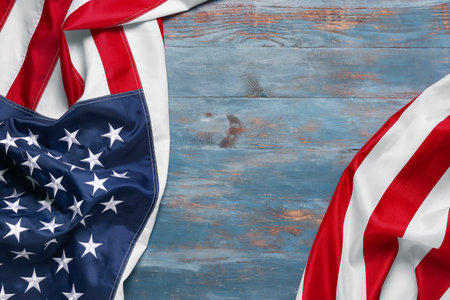 National flag of America on color wooden background. Independence Day celebrationの写真素材