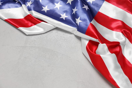 National flag of America on grunge background. Independence Day celebration