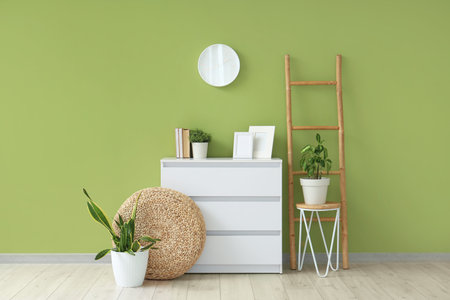 Interior of living room with commode and ladder