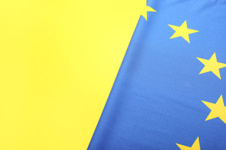 Flag of European Union on yellow background