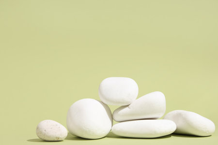 Stack of pebbles on green background. Zen conceptの写真素材