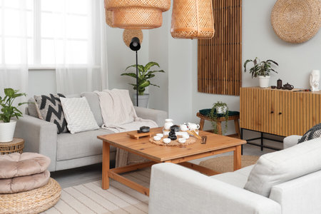 Chinese tea ceremony set on table in interior of living room
