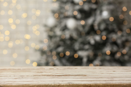 Empty wooden table in room on Christmas Eve