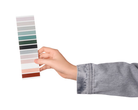 Female hand with color palette isolated on white backgroundの写真素材