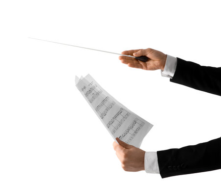 Hands of male conductor with baton and note sheet on white backgroundの写真素材