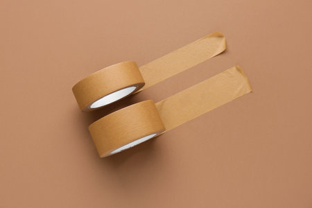 Rolls of masking tape on brown backgroundの写真素材