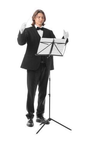 Male conductor with note sheets on white backgroundの写真素材