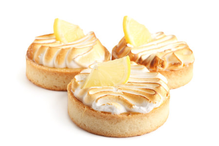 Tasty lemon tartlets on white backgroundの写真素材
