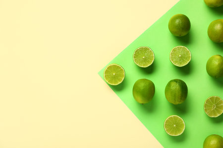 Fresh ripe limes on colorful backgroundの写真素材