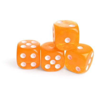 Orange dices on white backgroundの写真素材