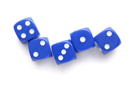 Many blue game dices on white background