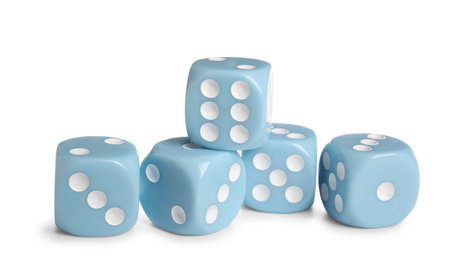 Many blue game dices on white background