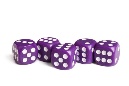 Many purple game dices on white backgroundの写真素材