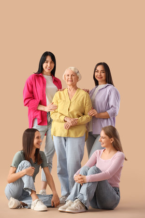Group of beautiful women on beige background. Feminism concept