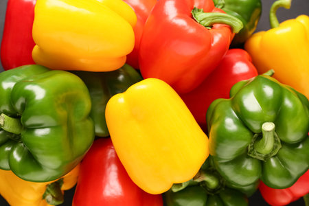 Texture of fresh colorful bell peppers, closeup