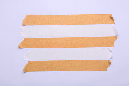 Strips of masking tape on white backgroundの写真素材