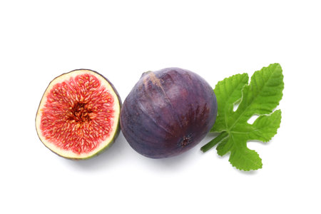 Fresh ripe figs with leaf on white background