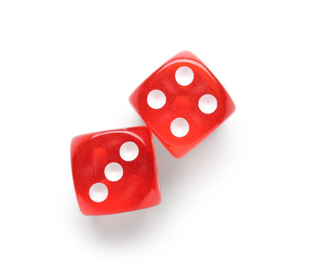 Red game dice on white background