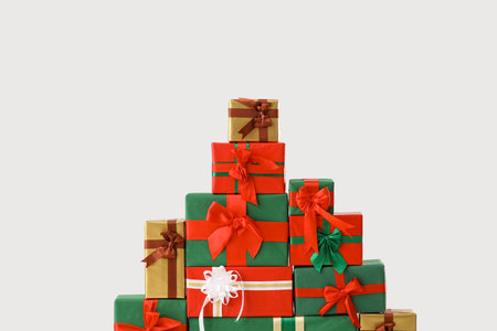 Stack of different Christmas gift boxes on white background, closeupの写真素材